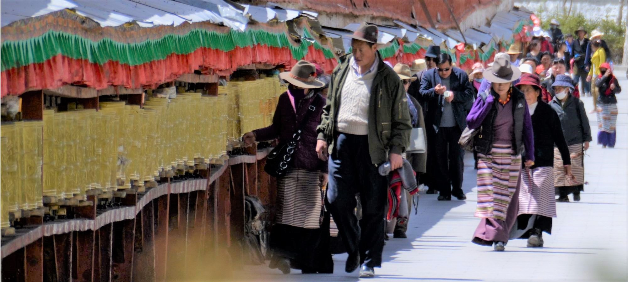 Worshippers turn prayer wheels, Lhasa